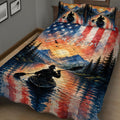 Close view of kayak quilt blanket with paddler silhouette, sunset mountain lake, trees, and red blue accents