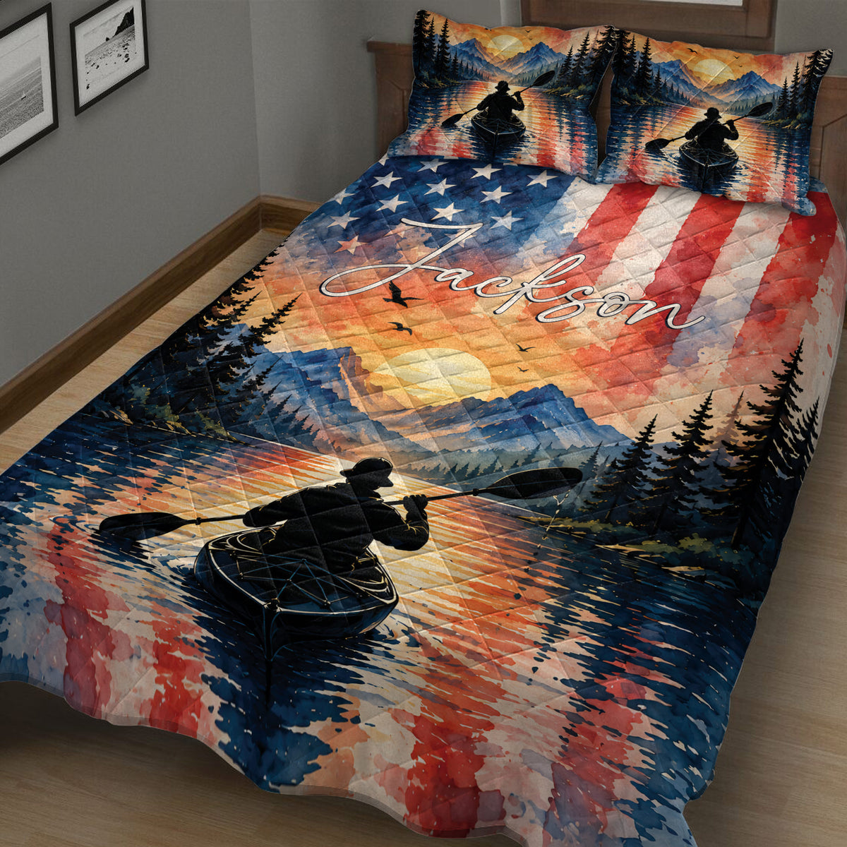 Close view of kayak quilt blanket with paddler silhouette, sunset mountain lake, trees, and red blue accents
