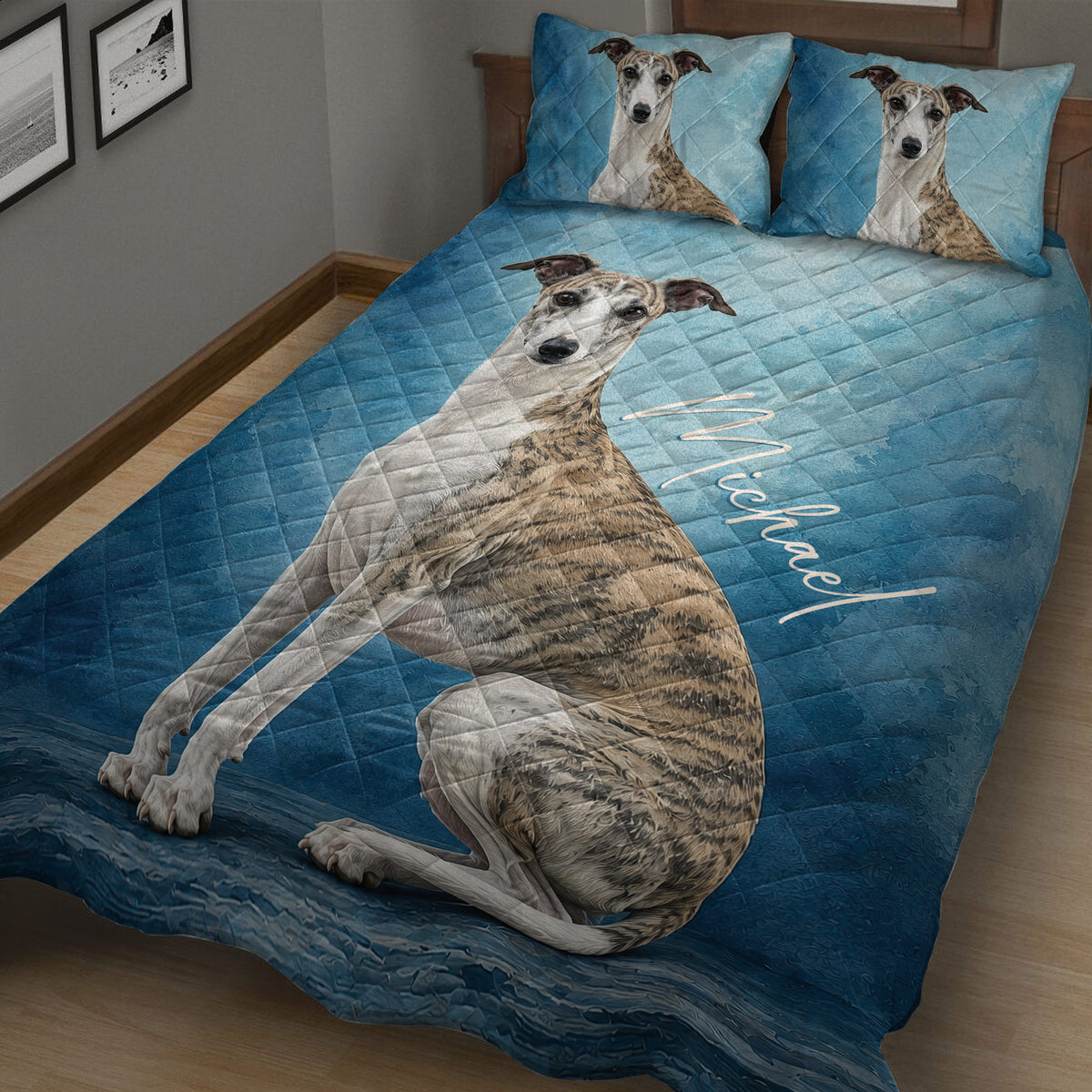 Blue Whippet quilt blanket displayed across a bed with matching dog artwork