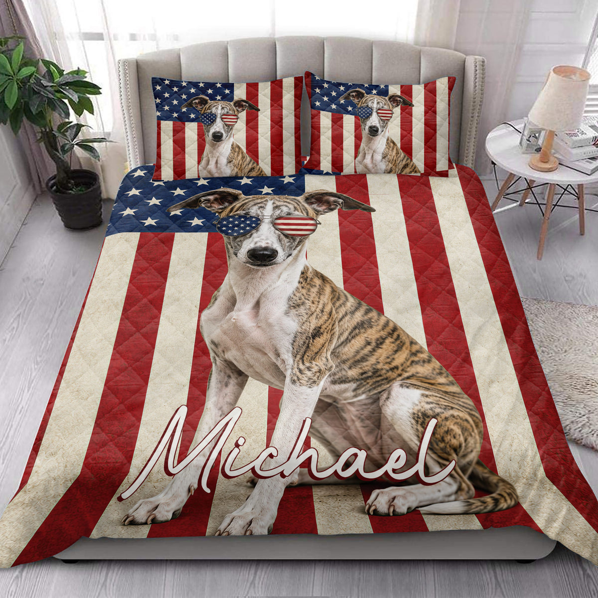 Patriotic Whippet quilt blanket styled on a bright bedroom bed with flag-themed pillows