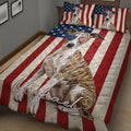 American flag Whippet quilt blanket displayed across a bed in a cozy bedroom