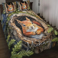Squirrel quilt blanket displayed on a bed with woodland trees, ferns, and a large orange squirrel design