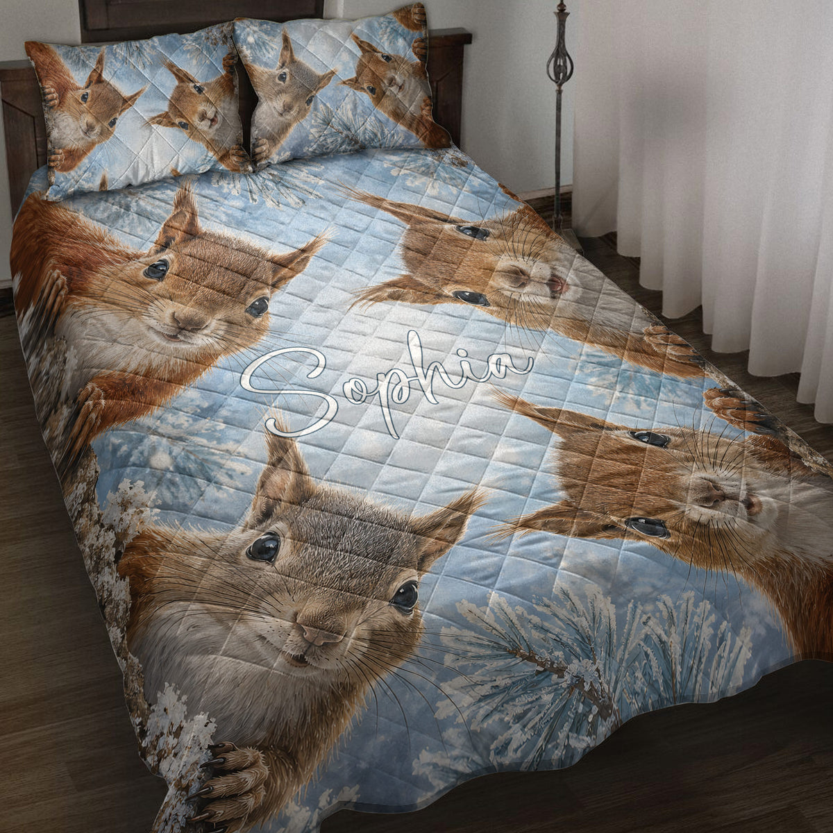 Squirrel quilt blanket bedding set displayed on a bed with playful woodland squirrels and blue winter branches