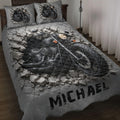 Biker quilt bedding set displayed on a bed with black motorcycle artwork breaking through a cracked concrete design