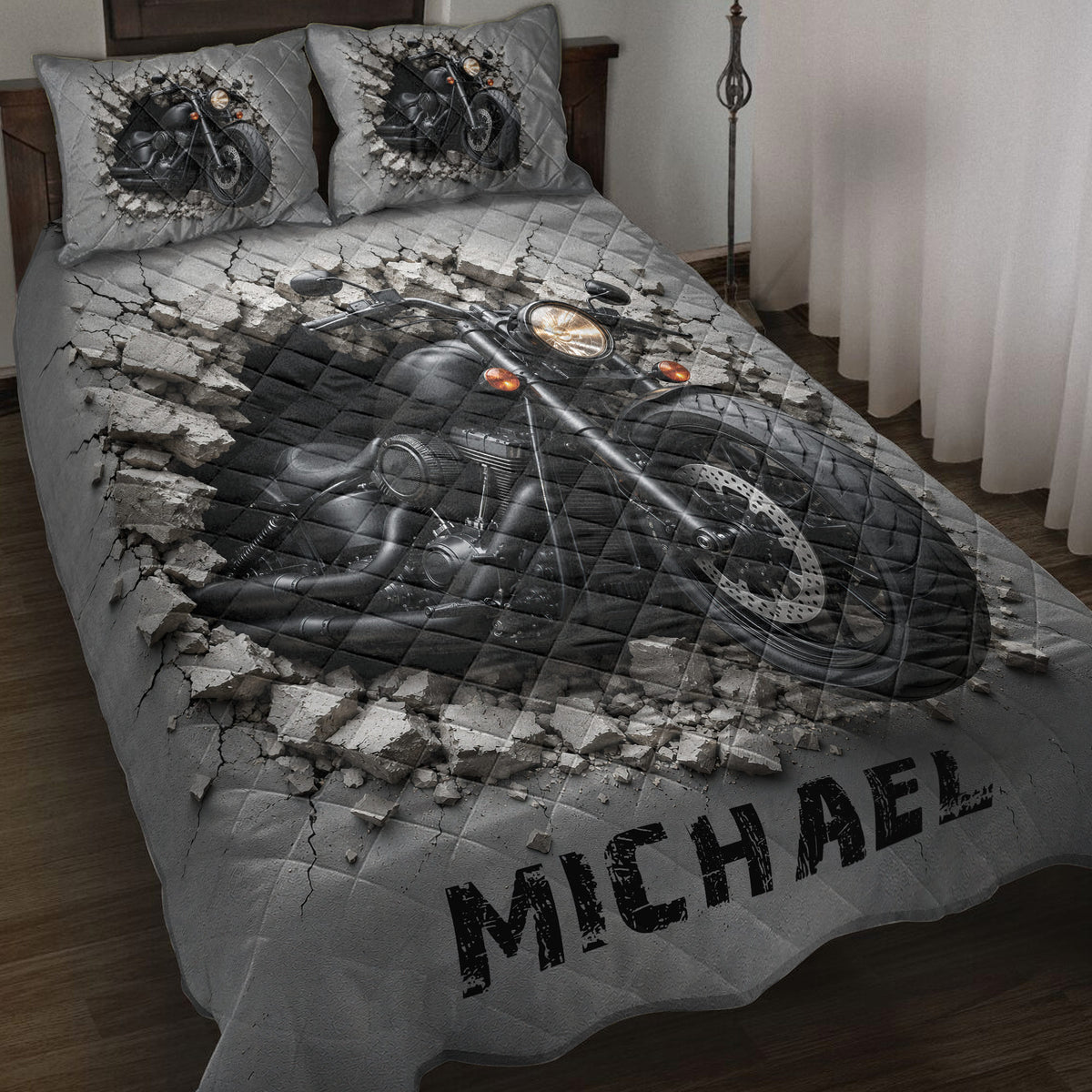 Biker quilt bedding set displayed on a bed with black motorcycle artwork breaking through a cracked concrete design