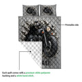 Biker quilt showing the printed motorcycle side and white quilted backing in a product construction view