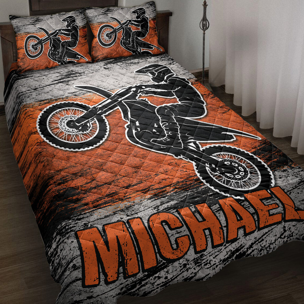 Motocross quilt bedding set with dirt bike rider artwork in orange, black, and gray