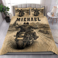 Biker quilt bedding styled in a bright bedroom with motorcycle rider, mountain landscape, and rustic road artwork