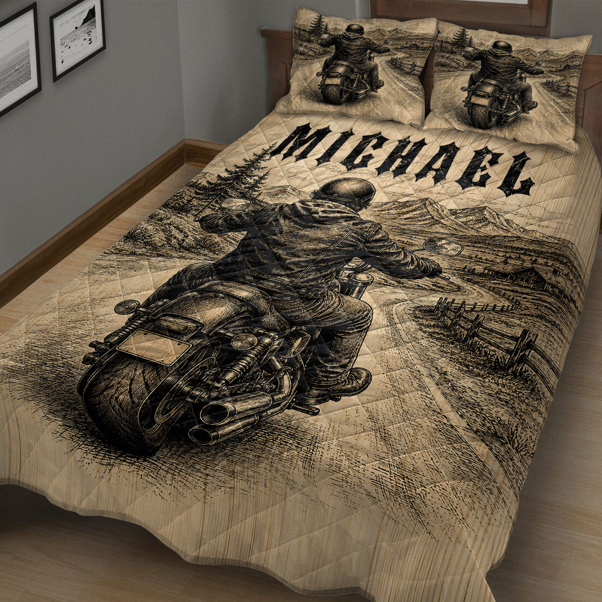 Close bedroom view of biker quilt blanket featuring a motorcycle rider traveling through a mountain landscape
