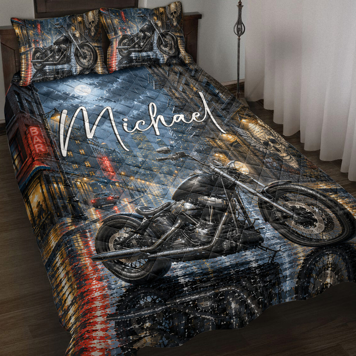 Biker quilt blanket displayed on a bed with motorcycles, rainy city streets, skull artwork, and dark urban colors