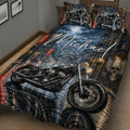 Motorcycle biker quilt blanket displayed across a bed with dramatic night city artwork and dark blue, black, and red tones