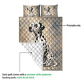 Dalmatian quilt showing the printed front design and white quilted backing