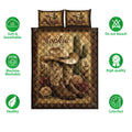 Front-facing cowgirl quilt blanket featuring Western boots, cowboy hat, cactus, roses, and decorative border