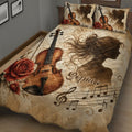 Close bedroom view of a violin quilt blanket with roses, sheet music, and elegant musician silhouette