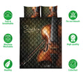 Violin quilt bedding set shown fully with matching instrument artwork and soft green accents