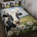 Dairy cow quilt blanket featuring a black-and-white cow, daisy meadow, blue sky, and countryside scene