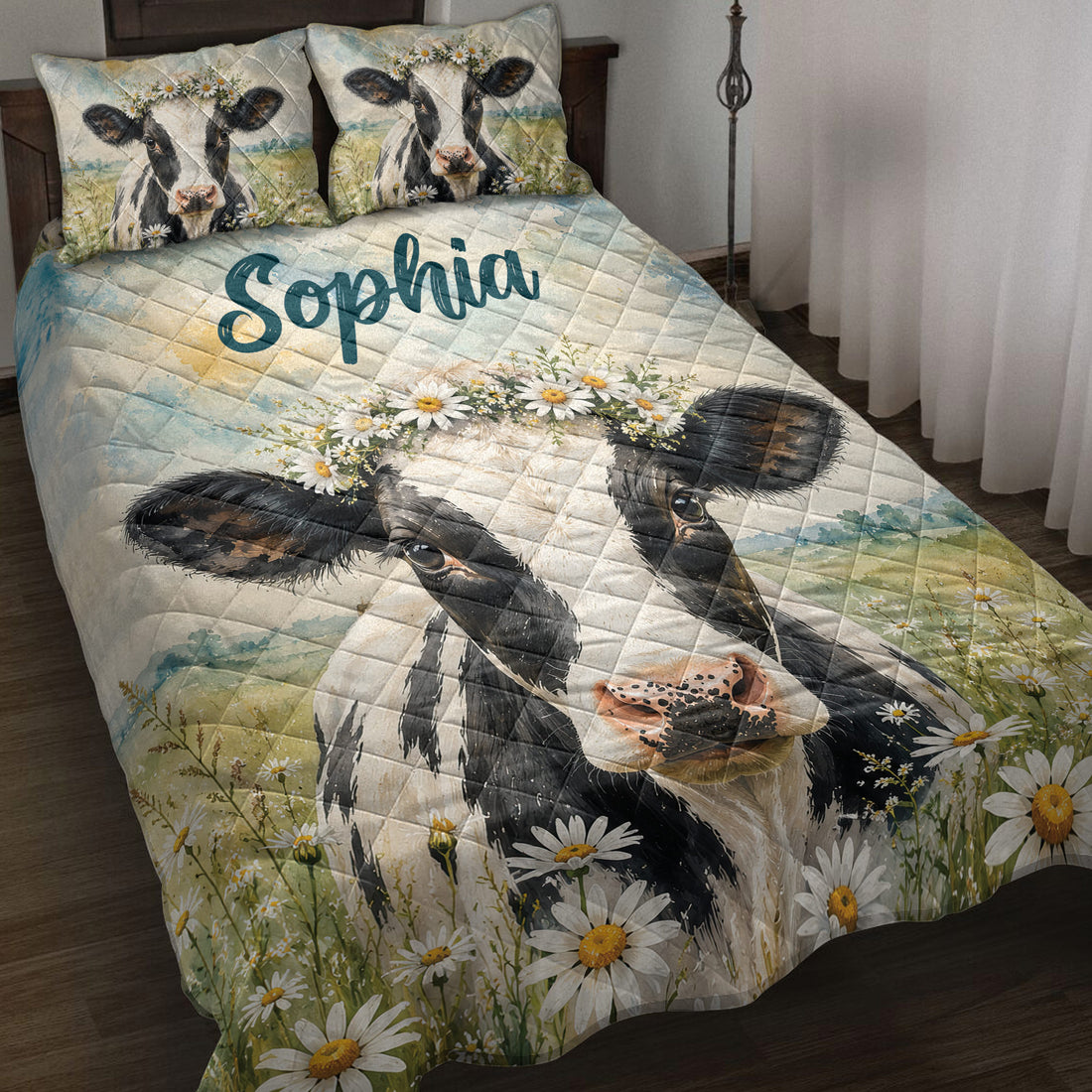 Dairy cow quilt blanket displayed on a bed with wildflowers, watercolor fields, and floral cow artwork
