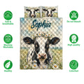 Dairy cow quilt bedding design with meadow flowers shown alongside soft and breathable feature icons