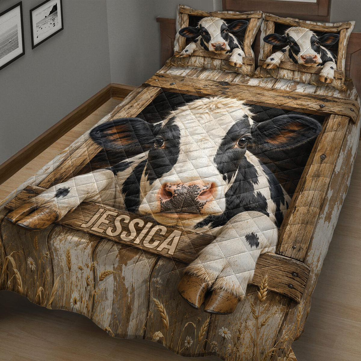 Close view of dairy cow quilt blanket with large black-and-white cow artwork and rustic farmhouse details
