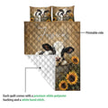 Dairy cow quilt blanket showing the printed front and white quilted backing detail