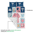 Nurse quilt blanket detail showing the printed medical artwork, white quilted backing, and caduceus design