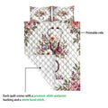 Nurse quilt detail showing the printed floral stethoscope design, quilted surface, and white backing