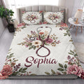 Nurse quilt blanket styled on a modern bed with floral stethoscope artwork and decorative bedroom accents