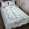 Nurse quilt blanket displayed on a bed with stethoscope, medical symbol, floral artwork, and inspirational lettering