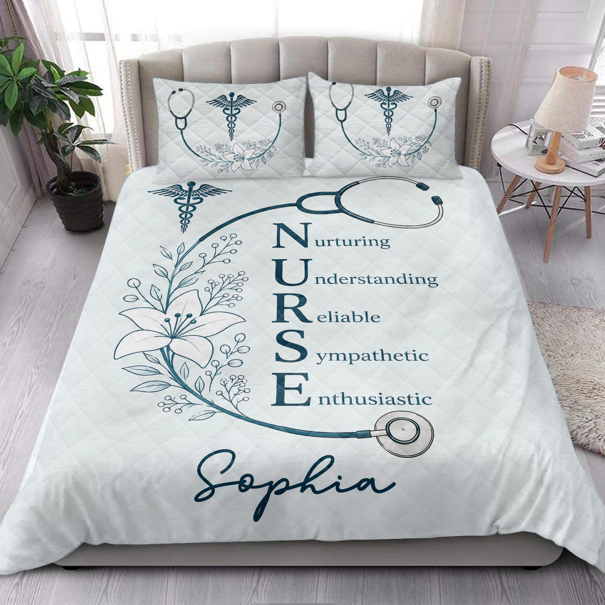 Nurse quilt blanket styled on a bed in a bright bedroom with teal medical symbols and floral stethoscope artwork