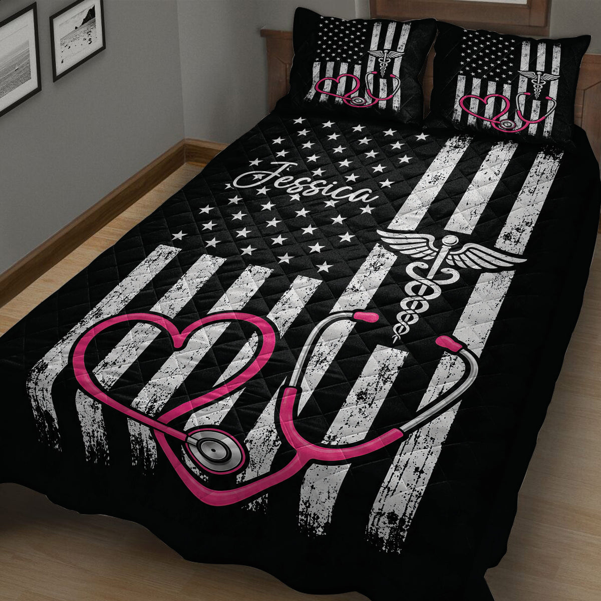 Black nurse quilt blanket displayed on a bed with stars, stripes, winged medical symbol, and pink stethoscope
