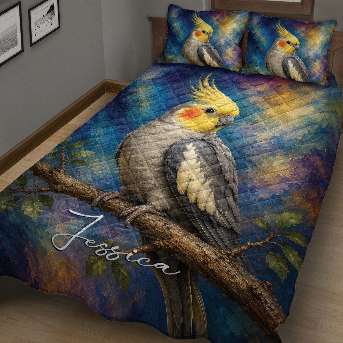 Close bedroom view of a cockatiel quilt blanket with colorful painterly artwork and branch details