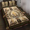 Cockatiel quilt blanket displayed on a bed with botanical panels, geometric borders, and vintage-inspired bird artwork