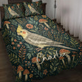 Cockatiel quilt blanket displayed on a bed with botanical foliage, flowers, mushrooms, and dark teal artwork