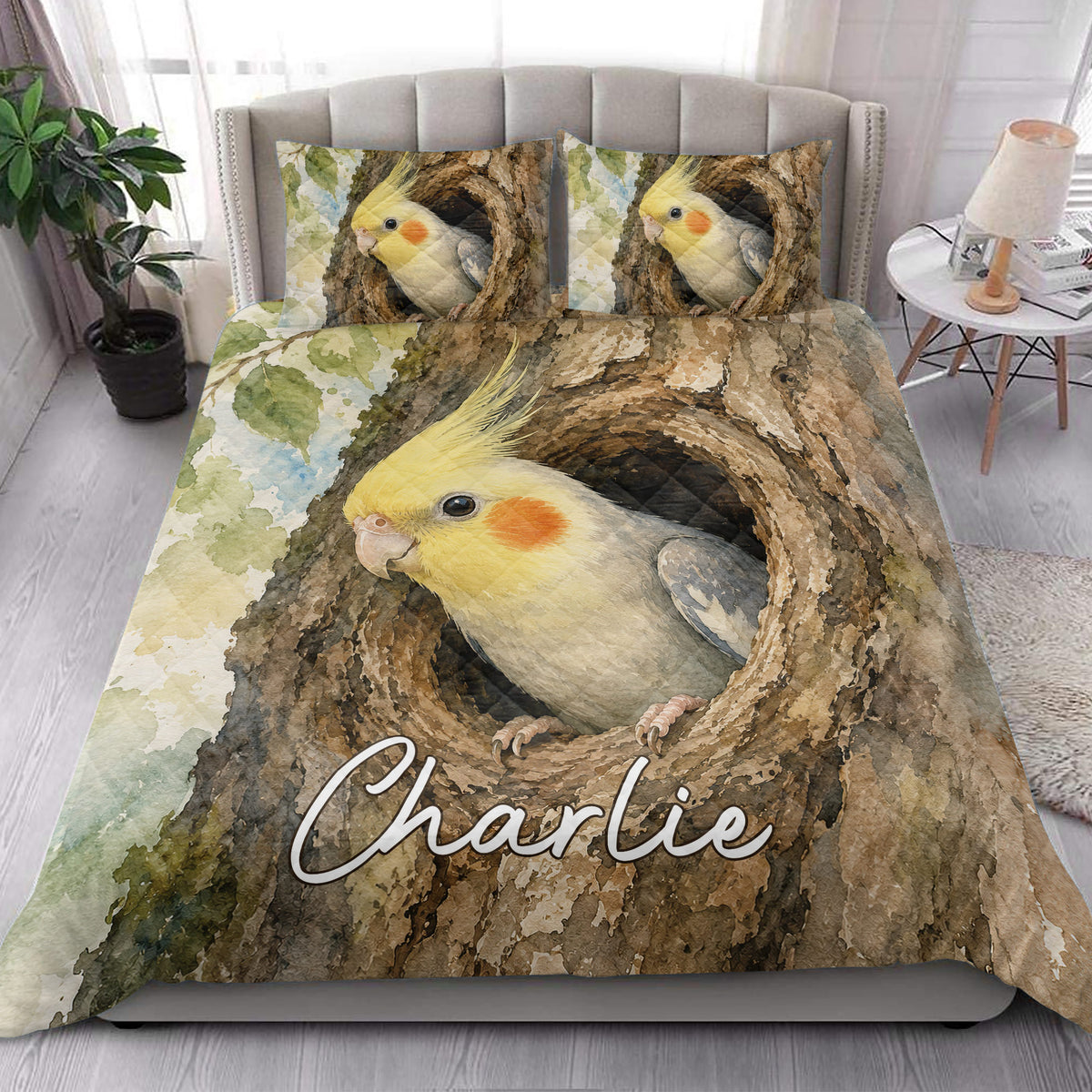 Cockatiel quilt blanket styled in a bright bedroom with large watercolor bird artwork
