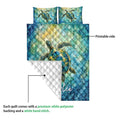 Sea turtle quilt showing the printed front, white quilted backing, and stitched construction