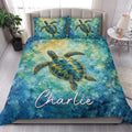 Sea turtle quilt blanket styled on a bright bedroom bed with turquoise watercolor artwork