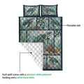 Sea turtle quilt showing the printed ocean artwork, quilted backing, and layered construction