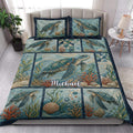 Sea turtle quilt bedding set styled in a bright bedroom with coral reef and coastal ocean artwork