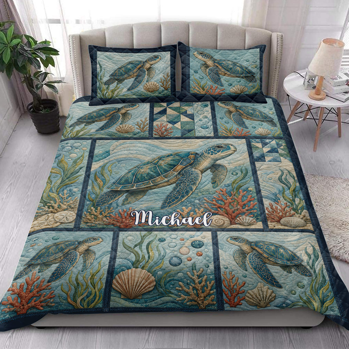 Sea turtle quilt bedding set styled in a bright bedroom with coral reef and coastal ocean artwork