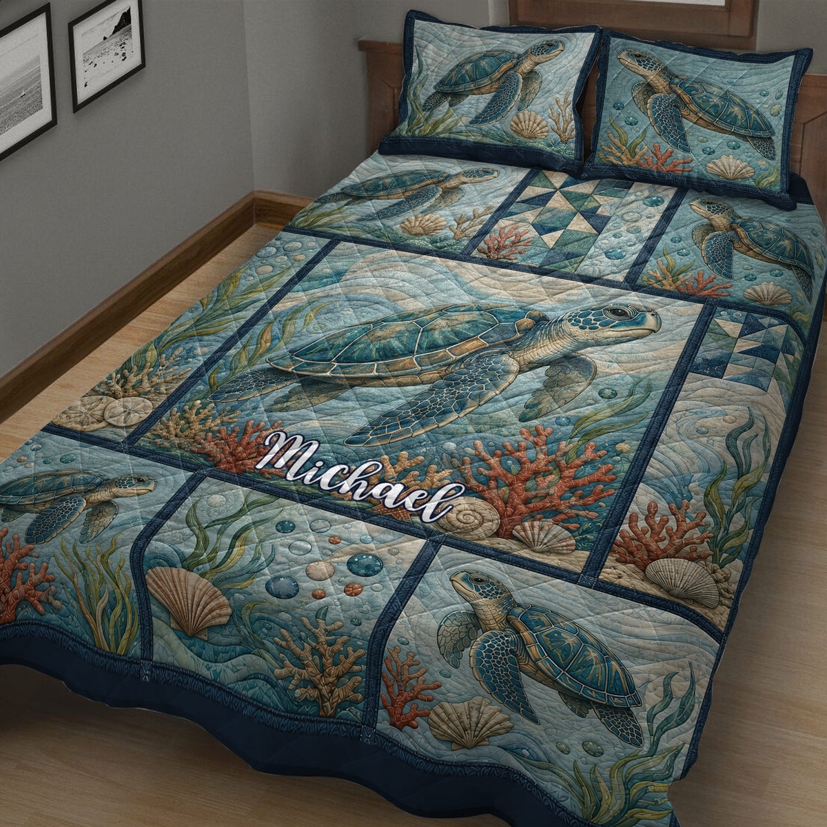 Close bedroom view of a sea turtle quilt with coral, shells, sea grass, and blue underwater scenery