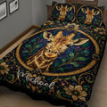 Close view of a giraffe quilt blanket featuring ornate floral borders, leafy patterns, and rich jewel-tone colors
