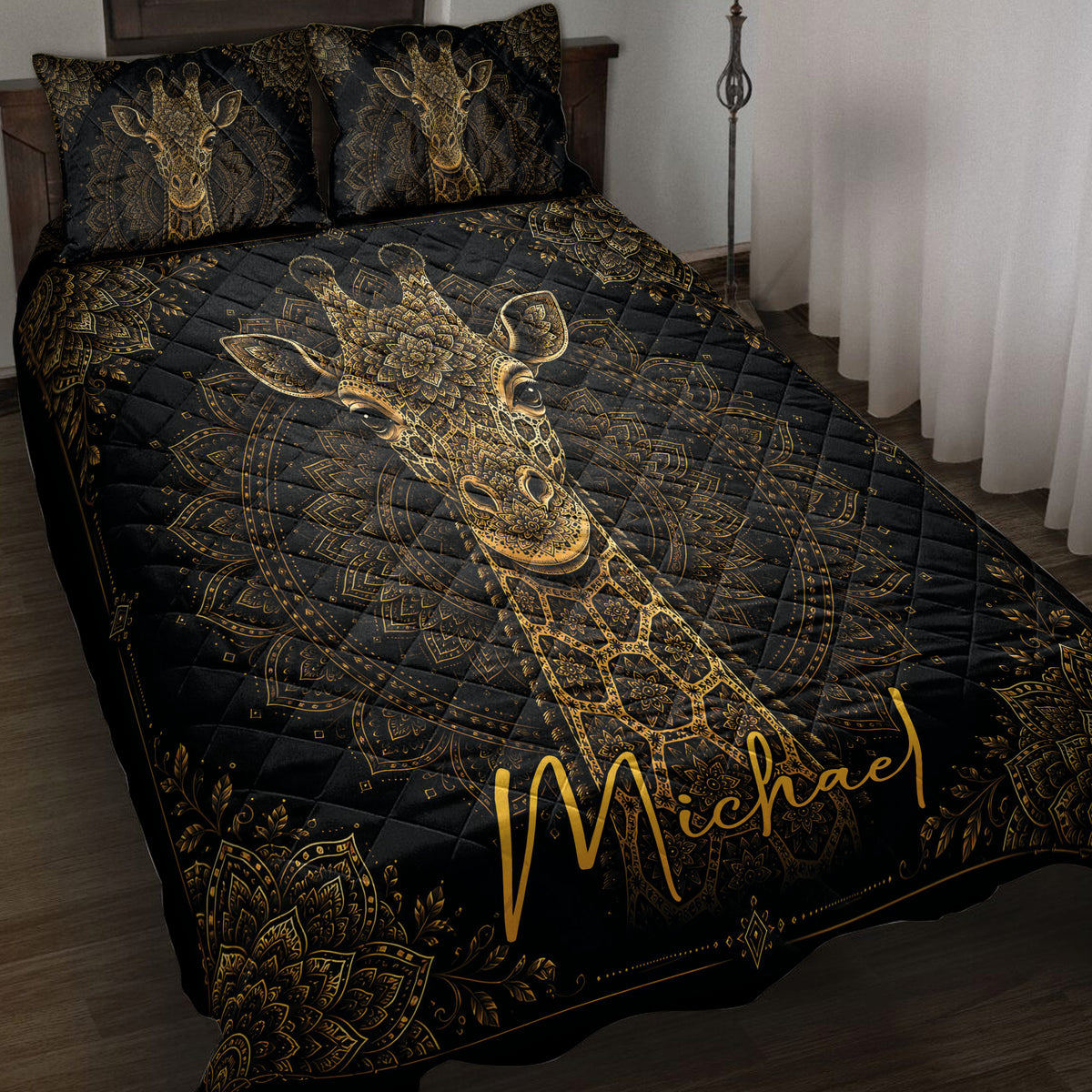 Black and gold giraffe quilt blanket displayed on a bed with matching giraffe pillow designs