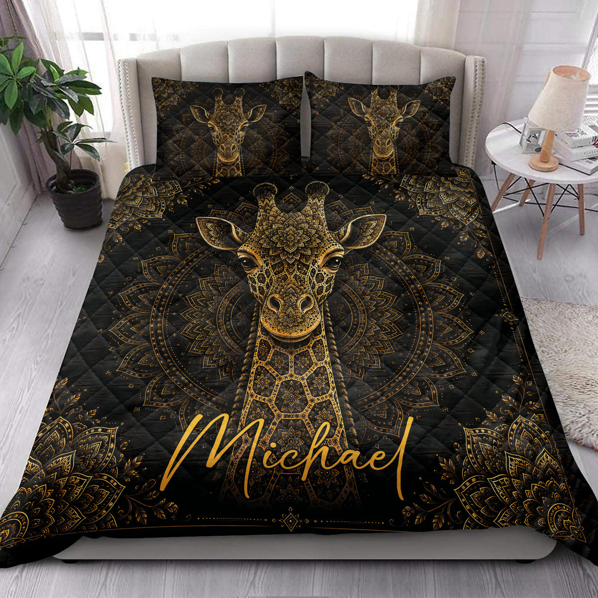 Black and gold giraffe quilt blanket styled in a bright bedroom with matching pillows
