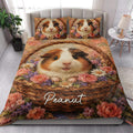 Guinea pig floral quilt blanket styled on a modern bedroom bed with matching decorative pillows