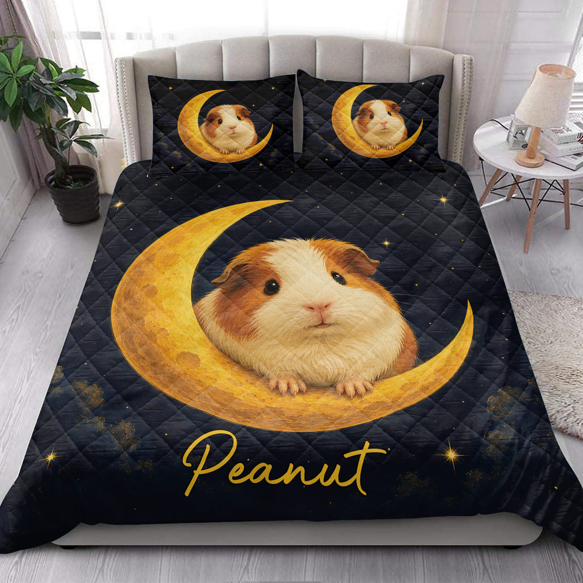 Guinea pig quilt blanket styled on a bedroom bed with matching moon and star pillowcase artwork