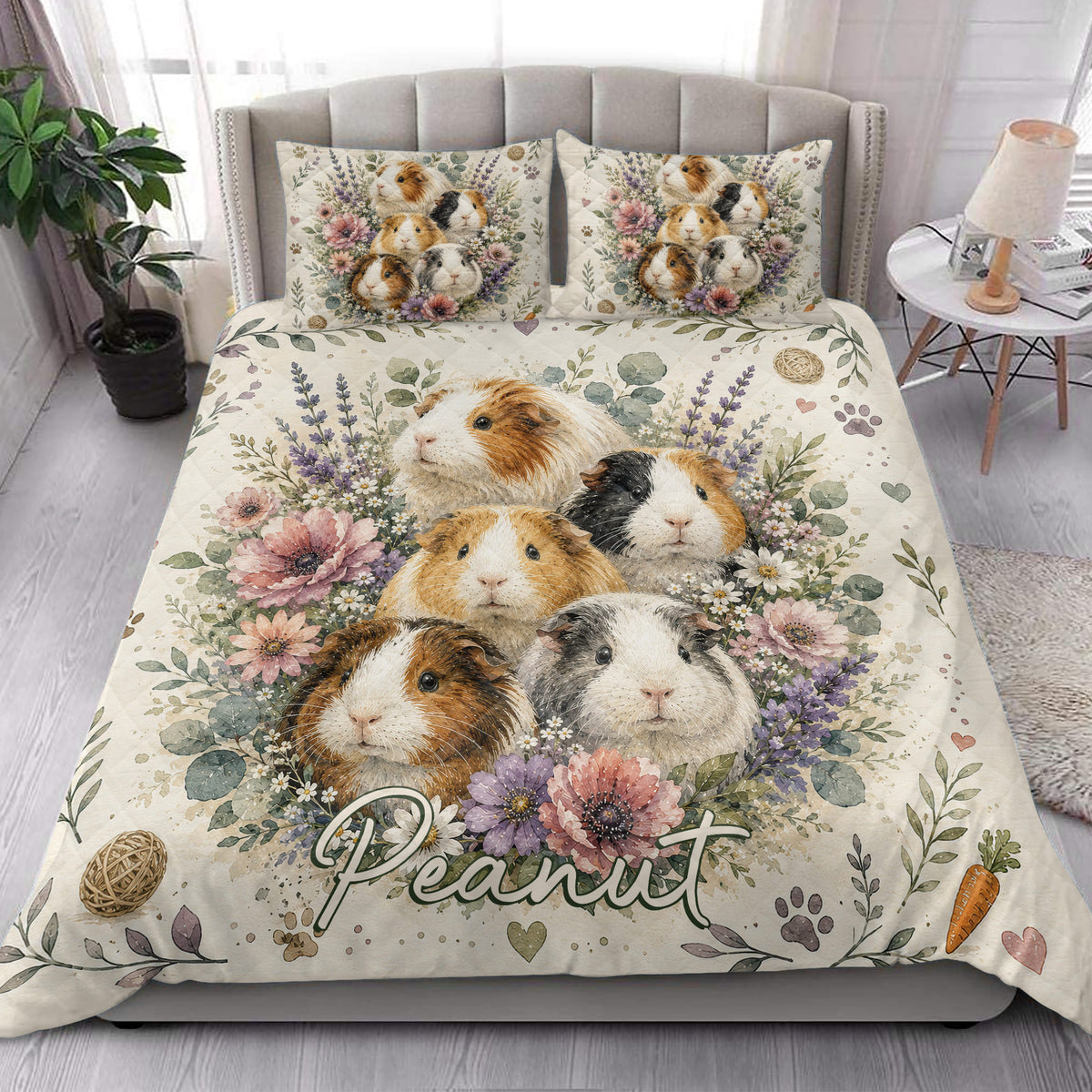 Guinea pig quilt bedding styled in a bright bedroom with matching floral guinea pig pillow artwork