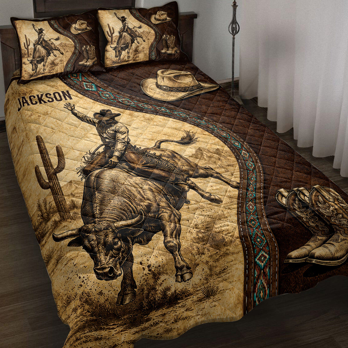 Rodeo quilt blanket displayed on a bed with bull rider, cowboy hat, boots, cactus, and Western artwork