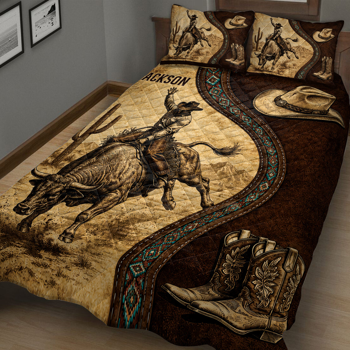 Close bedroom view of a rodeo quilt featuring a bull rider, desert landscape, cowboy hat, boots, and turquoise accents