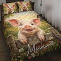 Pig quilt bedding set displayed on a bed with smiling piglets, wildflowers, rustic fencing, and farmhouse scenery