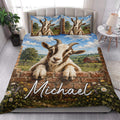 Goat quilt bedding styled in a bright bedroom with a large goat, barn, rolling hills, and wildflowers